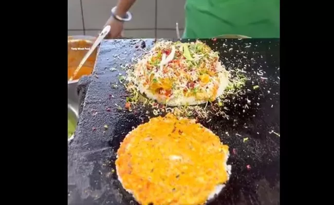 Street vendor viral burger idli recipe viral video - Sakshi